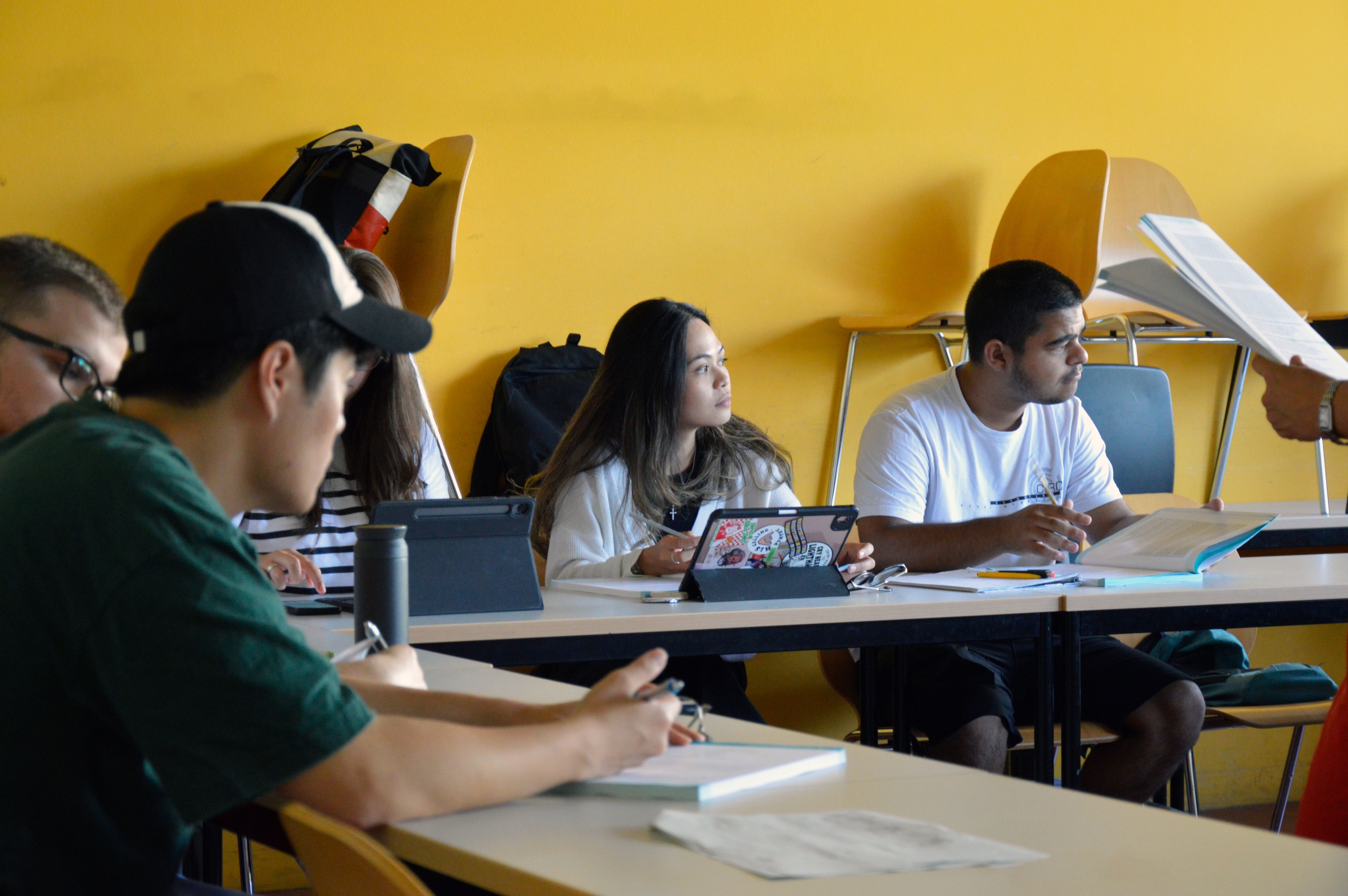 Students are sitting in a classroom.