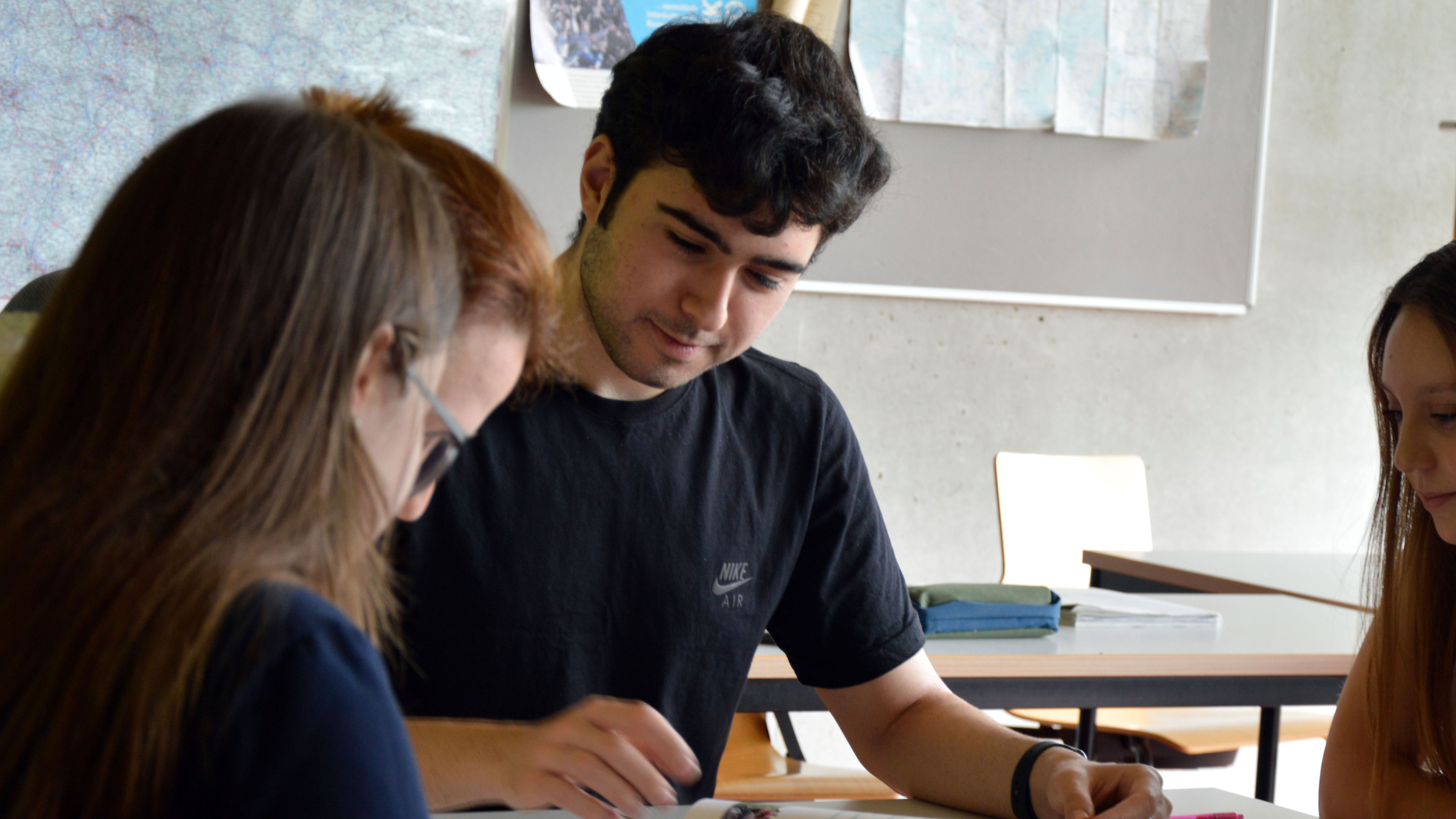 Students are sitting in a classroom.